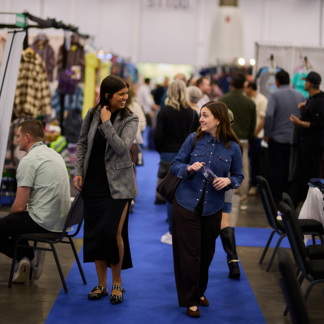 Fashion buyers browse aisles at OFFPRICE by Informa